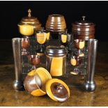 A Collection of Turned Lignum Vitae Items, mostly 19th century, to include three lidded pots,