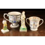 Two Cream-ware Loving Mugs and Two Prattware Figures: One of the twin handled mugs decorated with