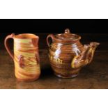 A 19th Century Halifax Slip-glazed Agateware Twin-spouted Teapot & Jug.