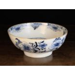 An 18th Century Blue & White Delft Bowl on a raised foot.