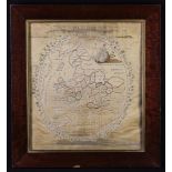 A 19th Century Silkwork Map of England & Wales contained in a oval bordered by entwined garlands of