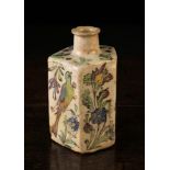 An Iznik Pottery Pentagonal Bottle Vase decorated with floral sprays, a fish and a bird,