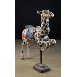 A 19th Century American Carved & Painted Wooden Carousel Deer (lacking antlers and one ear).