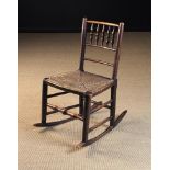 A Small 19th Century Spindled Rush-seat Rocking Chair.