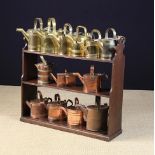 A Collection of Six Copper & Six Brass Watering Cans,