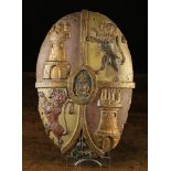 A Late 17th/Early 18th Century Carved and Polychromed Oval Wood Armorial 16½ in x 11 in (42 cm x 28