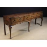 A George II Style Oak Low Dresser inlaid with mahogany cross-banding.