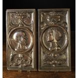 A Pair of 16th Century Oak Romayne Panels relief carved with the profiled head of an unusual