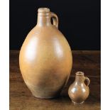 Two 18th Century Saltglazed Stoneware Flagons; A small Rheinish jug 5 in (13 cm) high,