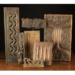 A Collection of Carved Oak Fragments & Panels: A 16th century enriched parchemin panel with fleur