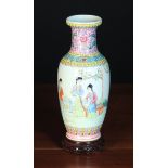 A Chinese Baluster Vase decorated with ladies at leisure and calligraphy beneath a banded neck of