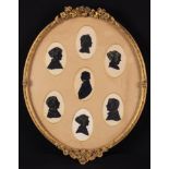 Seven 19th Century Silhouette Portraits set in a single mount with oval apertures within a