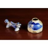 An Antique Chinese Blue & White Inkpot and a Brush Stand modelled in the form of a kylin.