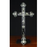 A Fine 19th Century Ebony Crucifix richly inlaid with mother-of-pearl flowers,