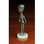 A Small Dogon Tribe Bronze Figure of a male with traces of gilding, mounted on a round base,