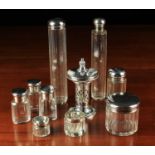 A Group of Seven Silver topped Vanity Jars & Bottles by Mappin & Webb and A Small & Unusual Silver