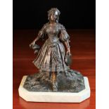 A 19th Century Bronze Figure of a Lady with tambourine stood bare foot on a grass bank,