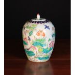 A Chinese Lidded Ovoid Jar decorated in polychromed enamels with river birds and lotus flowers,