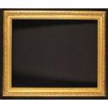 A 19th Century Moulded Gilt Picture Frame with decorative carving. The aperture 19 in x 24 in (48.