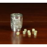 A Chinese White Metal Dice Tumbler entwined with a dragon and inscribed 'Dice Competition 1904',