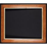 A 19th Century Moulded Woodgrained Picture Frame with gilt slip. The aperture 17½ in x 21¼ in (44.