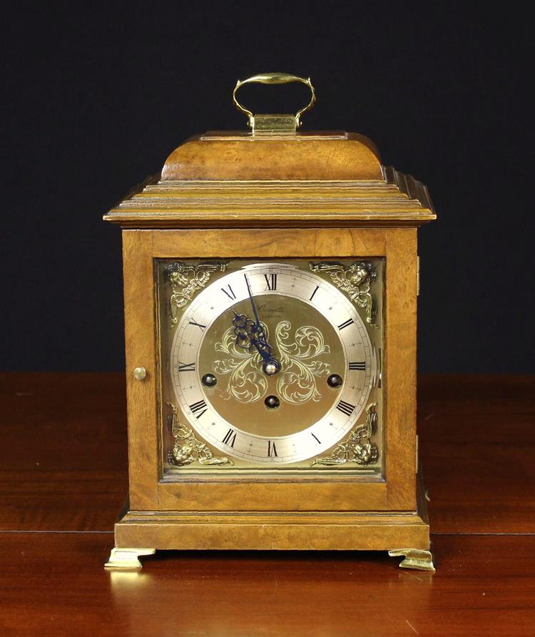 A Burr Walnut Musical Bracket Clock striking ten chimes, made for Comitti of London by Kieninger.