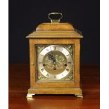 A Burr Walnut Musical Bracket Clock striking ten chimes, made for Comitti of London by Kieninger.