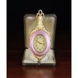 A Fine Early 20th Century Silver Gilt & Enamelled Miniature Cartel Clock by E. Grübelin Lucerne.