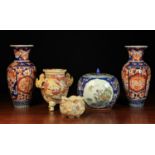 A Group of Five Oriental Vases & Jars: A pair of late 19th century Imari baluster vases with fluted