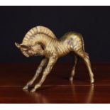 A Gold Patinated Bronze Zebra, signed DUNAND and numbered 1/3, 8¼ in (21 cm) high, 10ins (25.