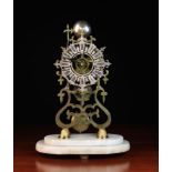 A Brass Skeleton Clock with fusee movement striking a bell,