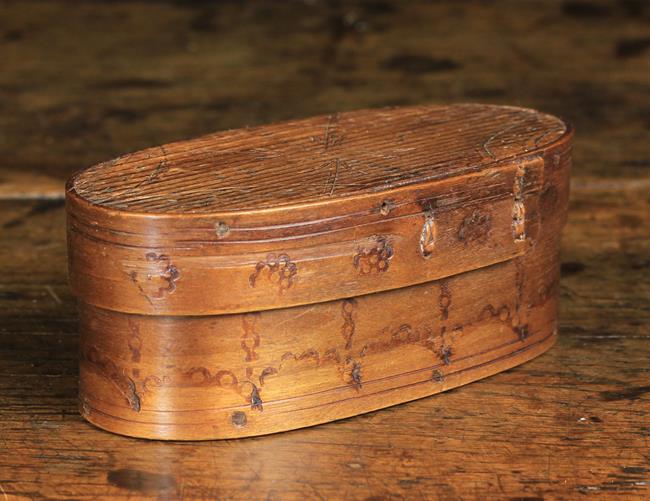 A Small Early 19th Century Oval Bentwood Box incised and punched with ornamentation,