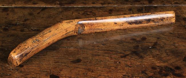 A Rustic Treen Lead Workers Crease Chaser, of good rich colour and patination. The handle stamped T.