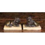 A Pair of Small 18th Century Cast Bronze Recumbent Lions reclining on rectangular travertine marble