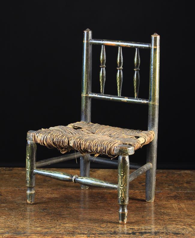 A Charming Early 19th Century Miniature Spindle back Armchair with original painted decoration and