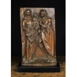 A 16th/17th Century Oak Relief carving of The Virgin & Child with St Anne,