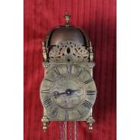 A Late 17th Century English Brass Lantern Clock with Alarum by Daniel Robinson, Nottingham.