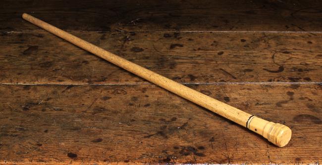 A Georgian Whale Bone Walking Stick having a Marine Ivory octagonal knop handle with incised