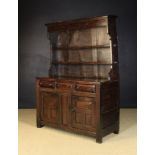 A Fine 18th Century Oak Canopy Dresser of deep, rich colour and patination.