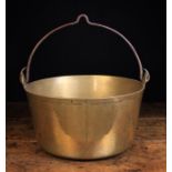 A Large 19th Century Brass Jam Pan with iron swing handle, 8 in (20 cm) high,