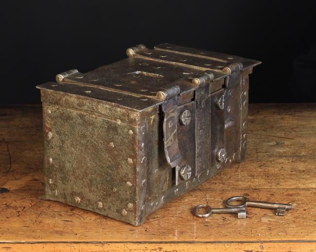 A 16th/17th Century Strong Box of rectangular form bound in studded straps,