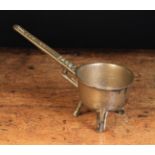 A Rare, Small 17th Century Bronze Skillet. The handle cast with maker's name Thos.