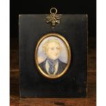 A 19th Century Miniature Portrait of a Gentleman painted on ivory and backed with mother-of-pearl.