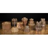 A Collection of Nine Decorative Victorian Copper Culinary Moulds including one with crowned Prince