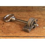 A 17th Century Key with intricate locking mechanism, probably an apprentice piece, 6½ in (16.