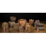 A Group of Ten Decorative Victorian Copper Culinary Moulds: To include two stamped with Benham &