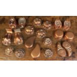 A Collection of Twenty Antique Miniature Copper Moulds, mostly in pairs,