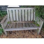 A teak garden bench for restoration