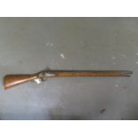 A Percussion Lock Musket - barrel length 85cm, brass mount to stock and trigger guard, walnut