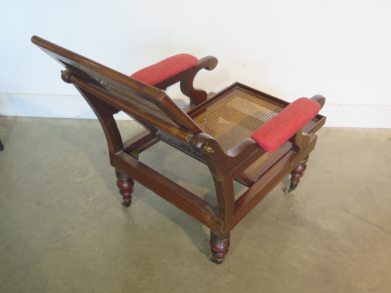 A mahogany framed campaign chair, cane back and seat folding, raised on turned supports - Image 4 of 5